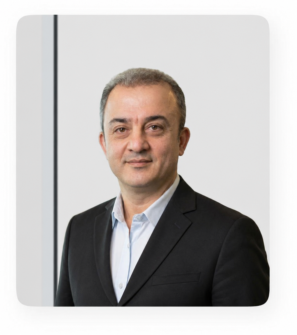 Formal portrait of Khalil Gholizadeh, Founder and Chairman of the Board of Romak